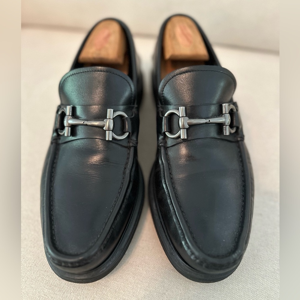 Two pairs of gorgeous Ferragamo classic loafers - black and brown.